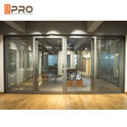 कार्यालय रंग के लिए आधुनिक डिजाइन पाउडर लेपित एल्यूमिनियम स्लाइडिंग दरवाजे वैकल्पिक वाणिज्यिक स्वचालित स्लाइडिंग ग्लास दरवाजे